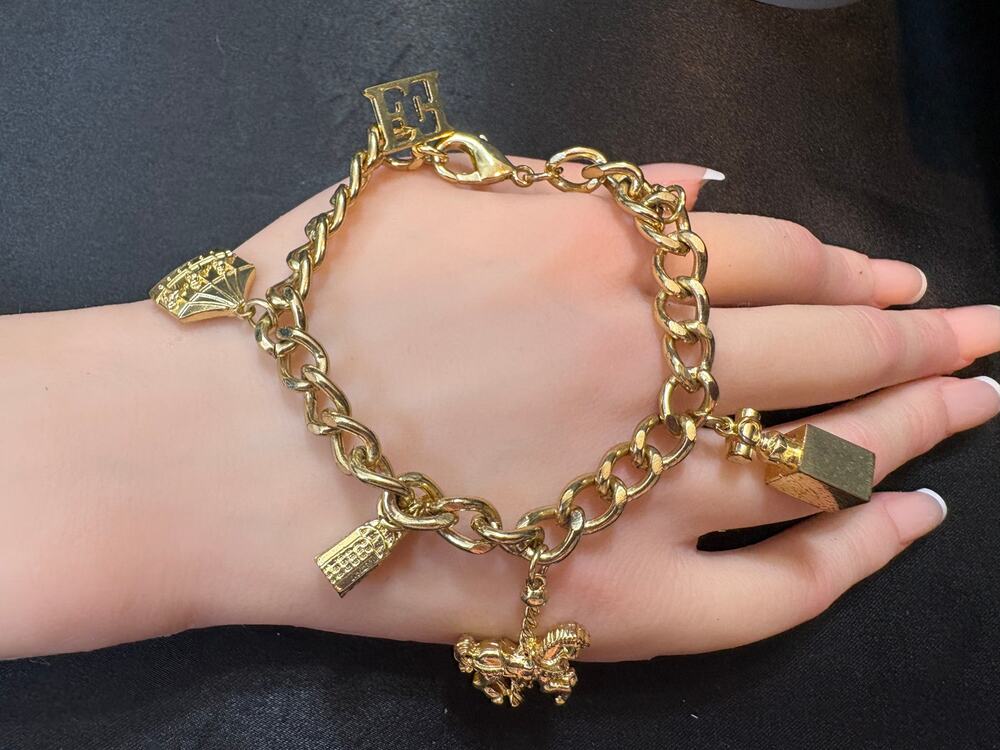 Escada Gold-Tone Carousel Charm Bracelet Signature E 7.25"